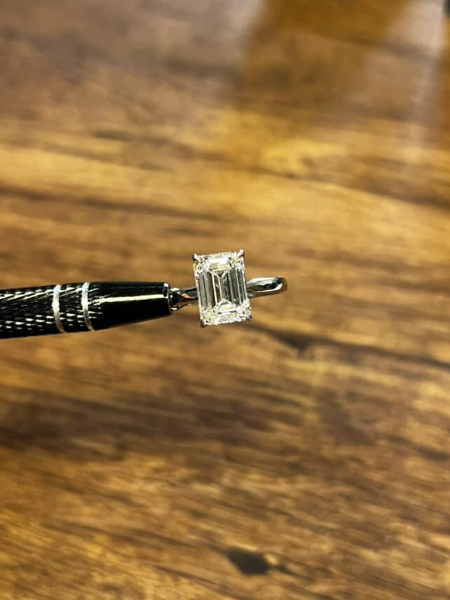 Emerald cut diamond solitaire ring